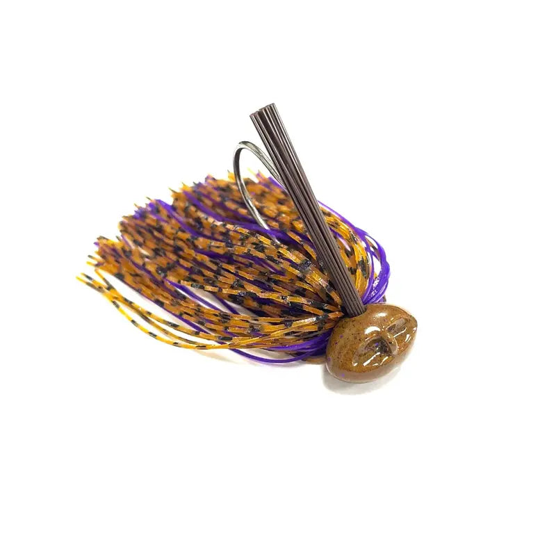 A fishing jig lure with a brown wood-grain bead head, a metal hook, dark brown wire, and a skirt made of orange, purple, and black strands, shown on a white background.
