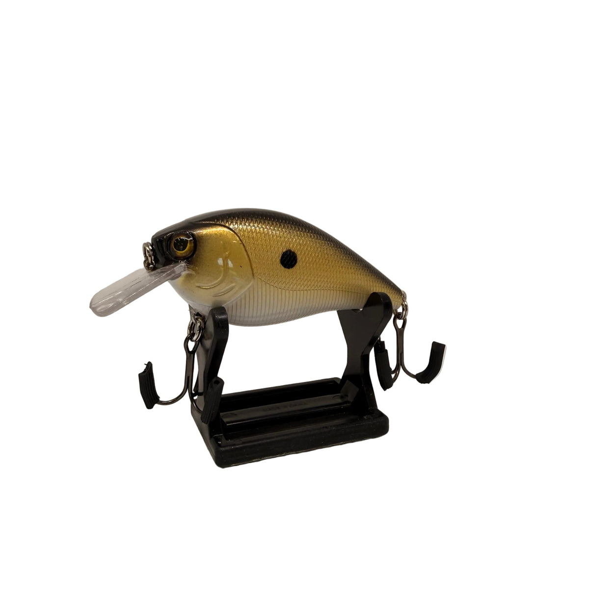 A fishing lure displayed on a black stand against a plain light background. The lure has a metallic gold and silver gradient body with a black top, a clear plastic diving lip, and black hooks attached.